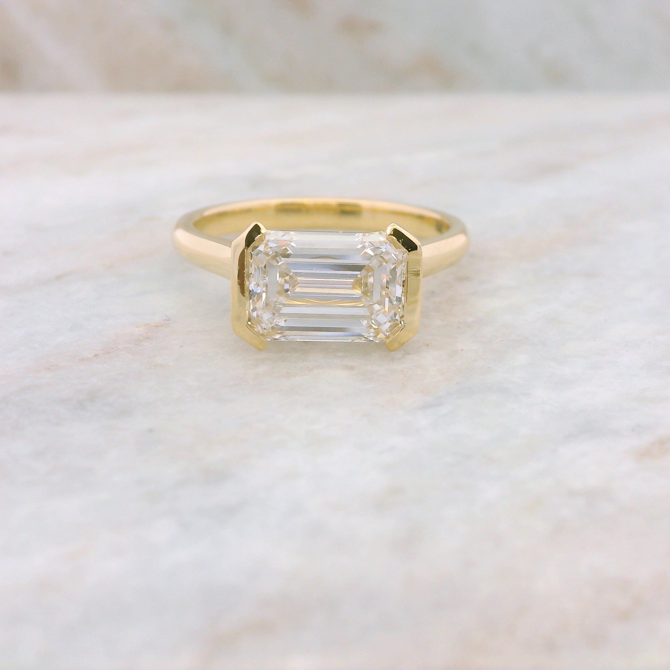 The Laura - Emerald Cut Solitaire Engagement Ring